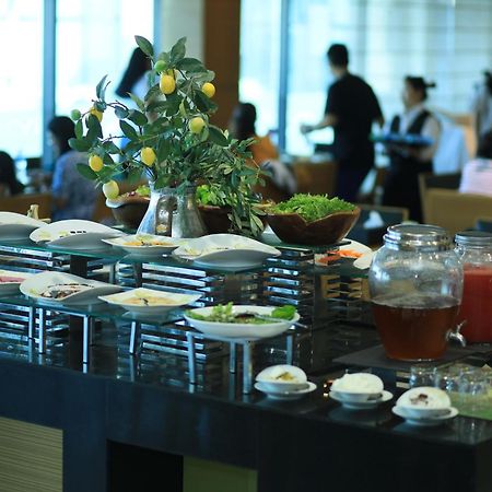 Ramee Grand Hotel And Spa Manama Exterior photo A buffet at a hotel