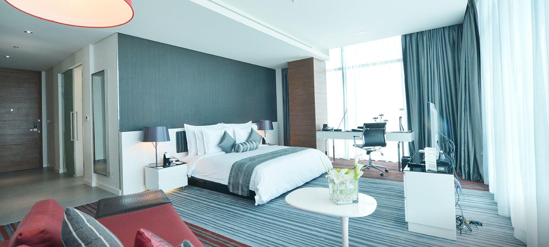 Ramee Grand Hotel And Spa Manama Exterior photo A bedroom in a hotel