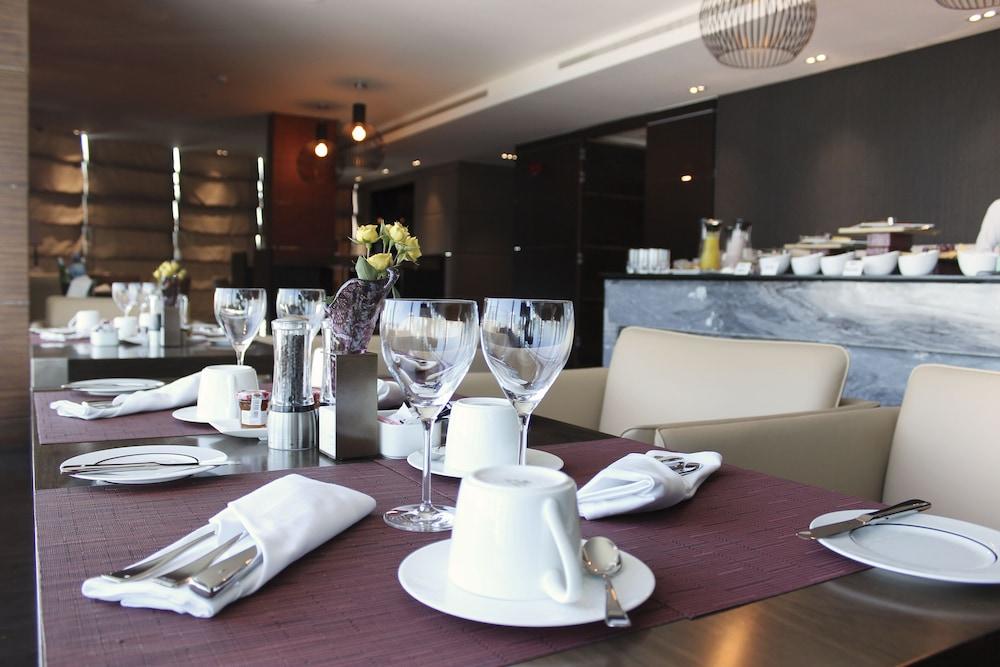 Ramee Grand Hotel And Spa Manama Exterior photo A table set for fine dining