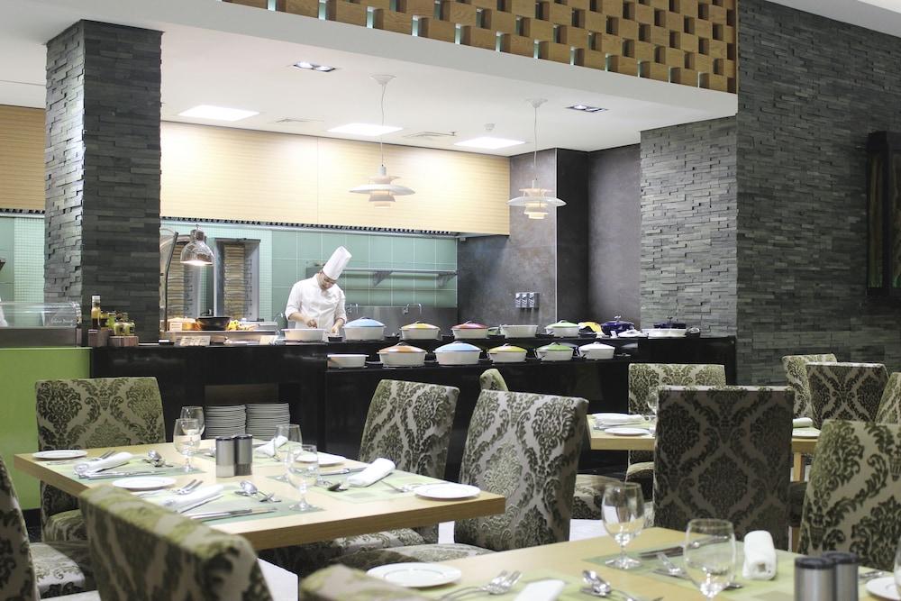Ramee Grand Hotel And Spa Manama Exterior photo The restaurant