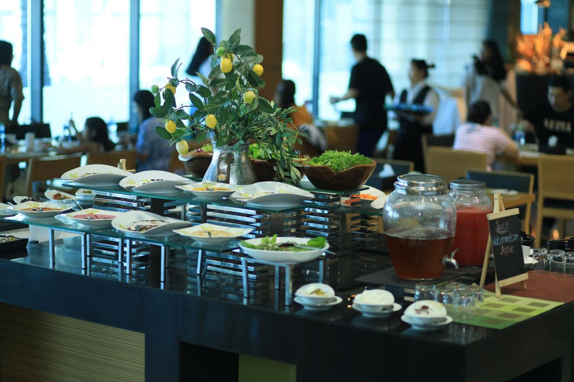 Ramee Grand Hotel And Spa Manama Exterior photo A buffet at a hotel