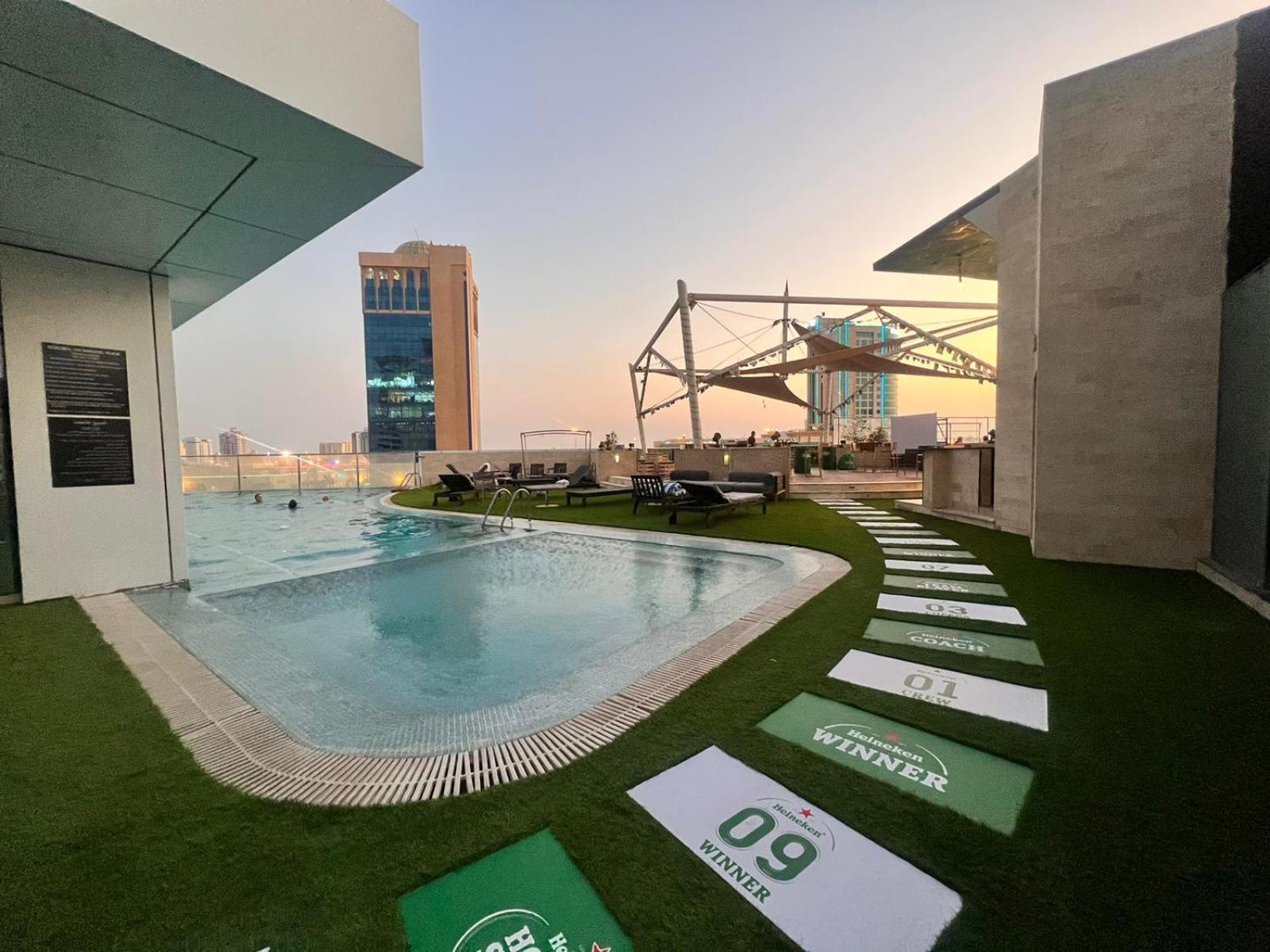Ramee Grand Hotel And Spa Manama Exterior photo Rooftop pool at the hotel