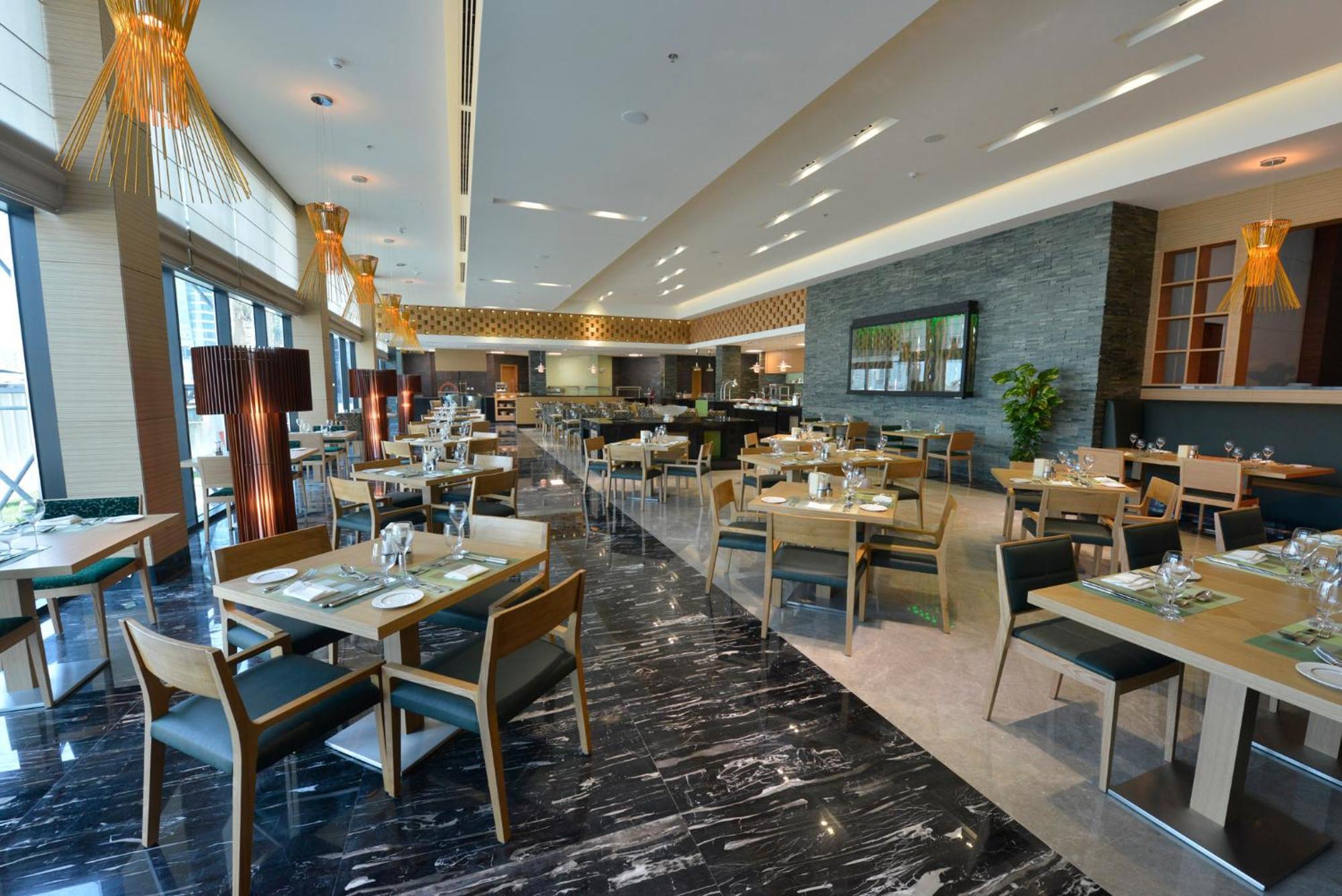 Ramee Grand Hotel And Spa Manama Exterior photo The restaurant