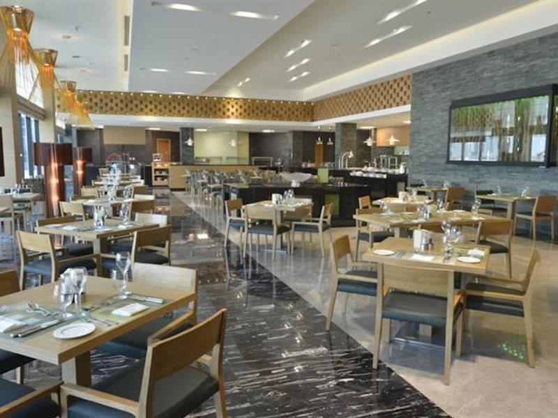 Ramee Grand Hotel And Spa Manama Exterior photo The restaurant